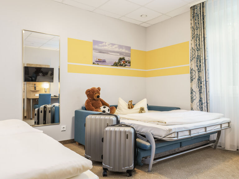 Dreibettzimmer