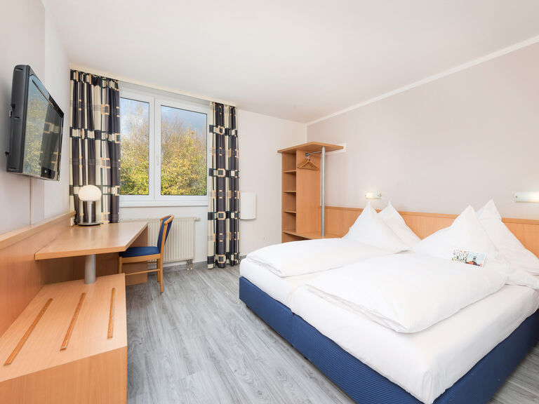 Dreibettzimmer