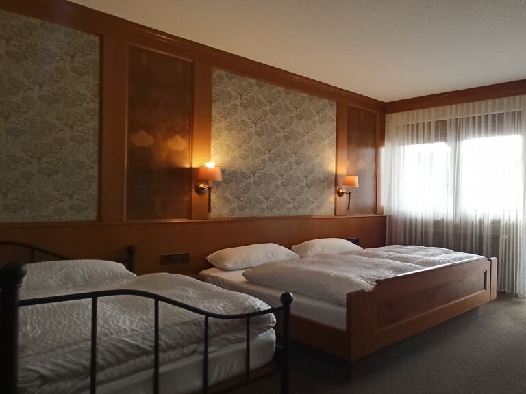 3-Bett-Zimmer mit Balkon