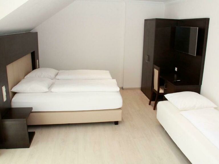 Dreibettzimmer
