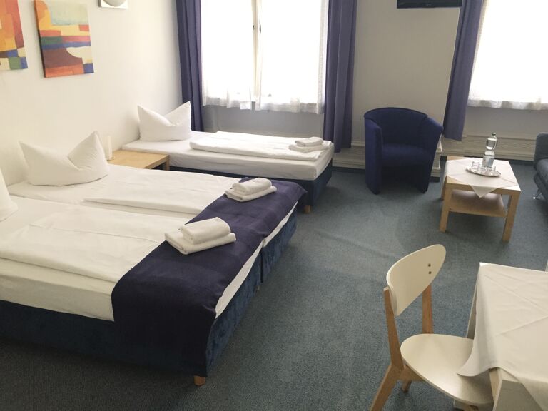 3-Bett-Zimmer mit Balkon