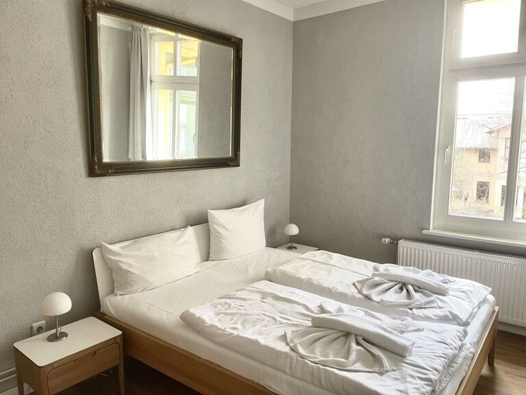 3-Bett-Zimmer mit Balkon