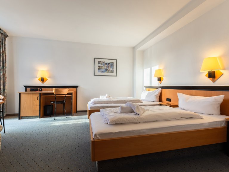 Twinbettzimmer mit Balkon