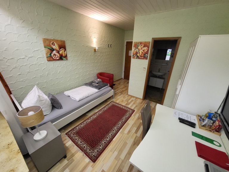 Einzelzimmer mit Balkon